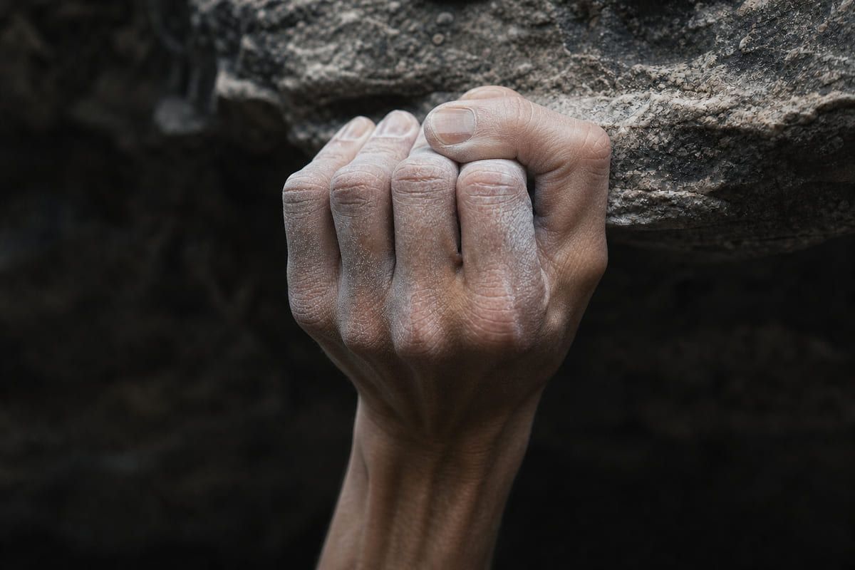 Full crimp grip loading the fingers.